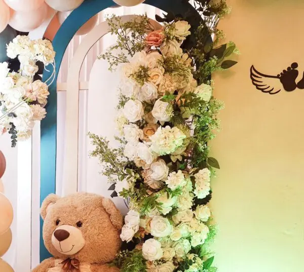 Teddy bear with mini balloon centerpiece for baby shower guest tables