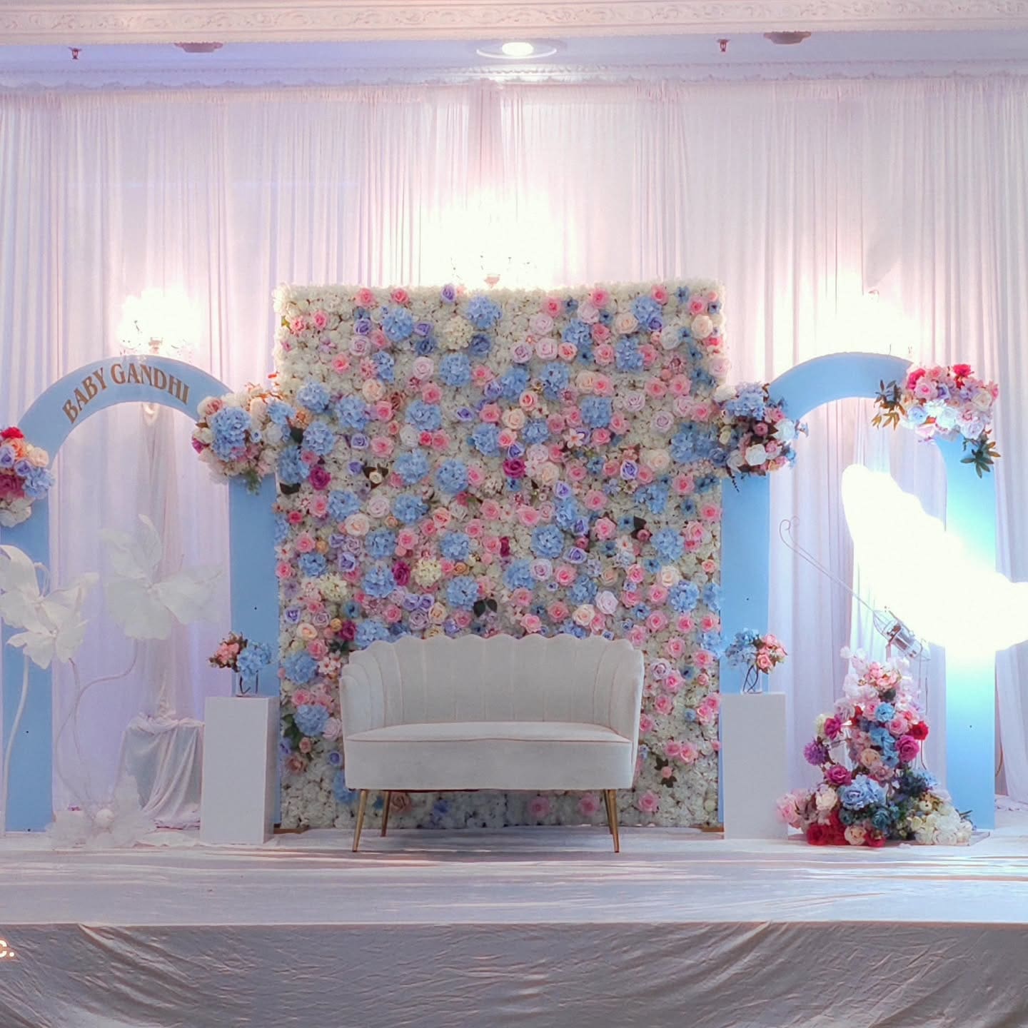 Close-up of flower wall backdrop with mixed pastel roses and hydrangeas