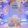 Coral and starfish props with blue baby shower arch